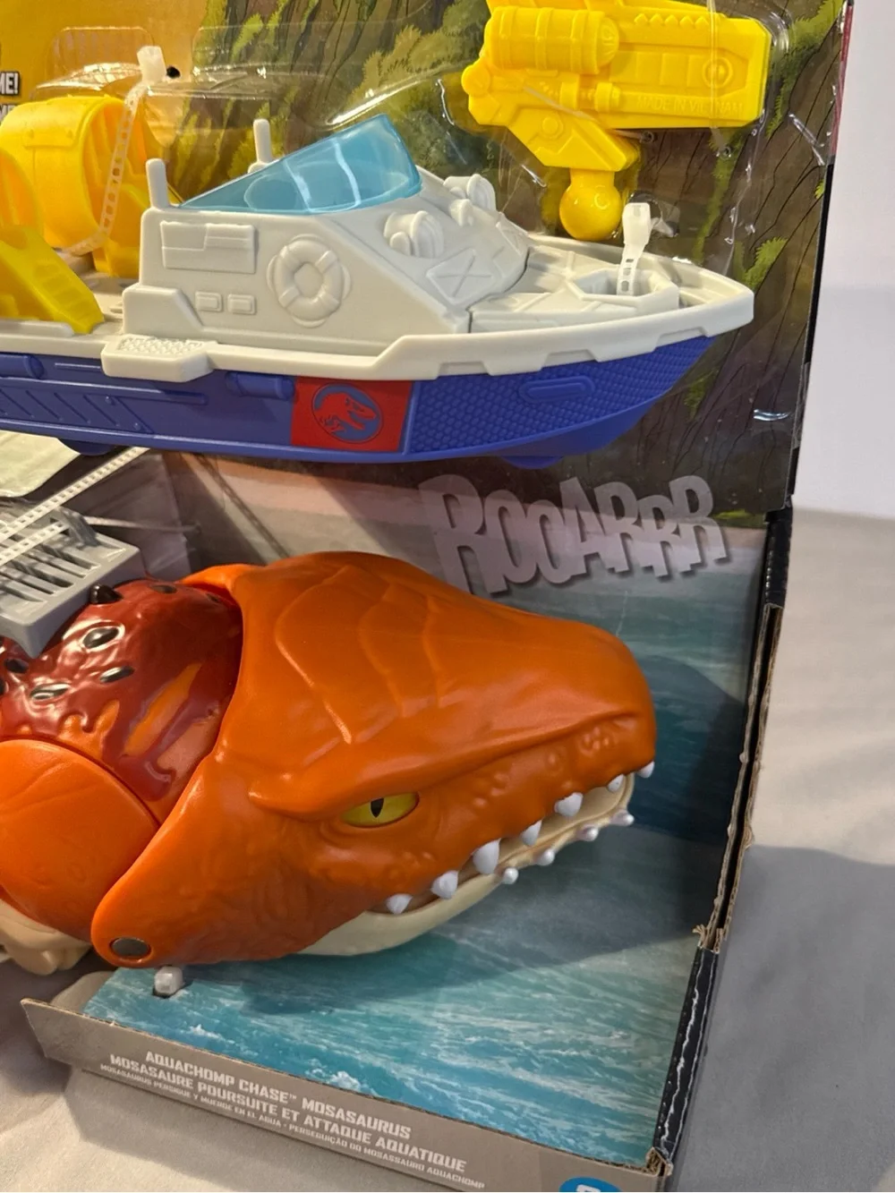 Fisher-Price Jurassic World Orange Dino Transport with Blue & Yellow Rescue Boat